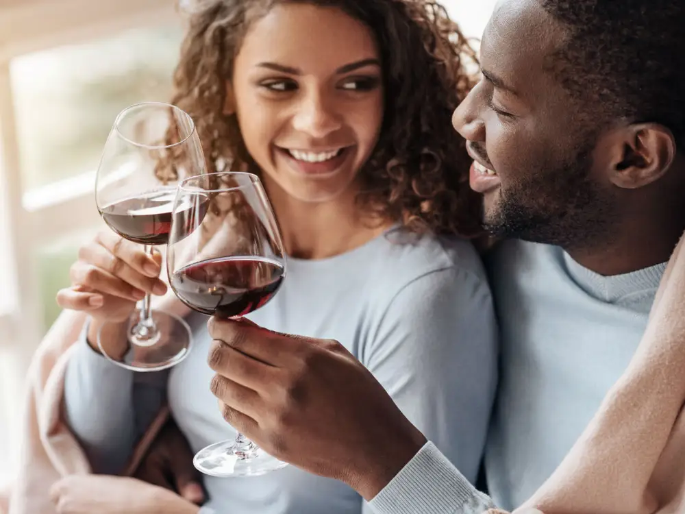 Mixed couple with drinks