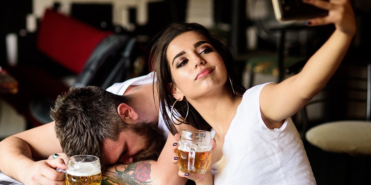 Man and woman with beer