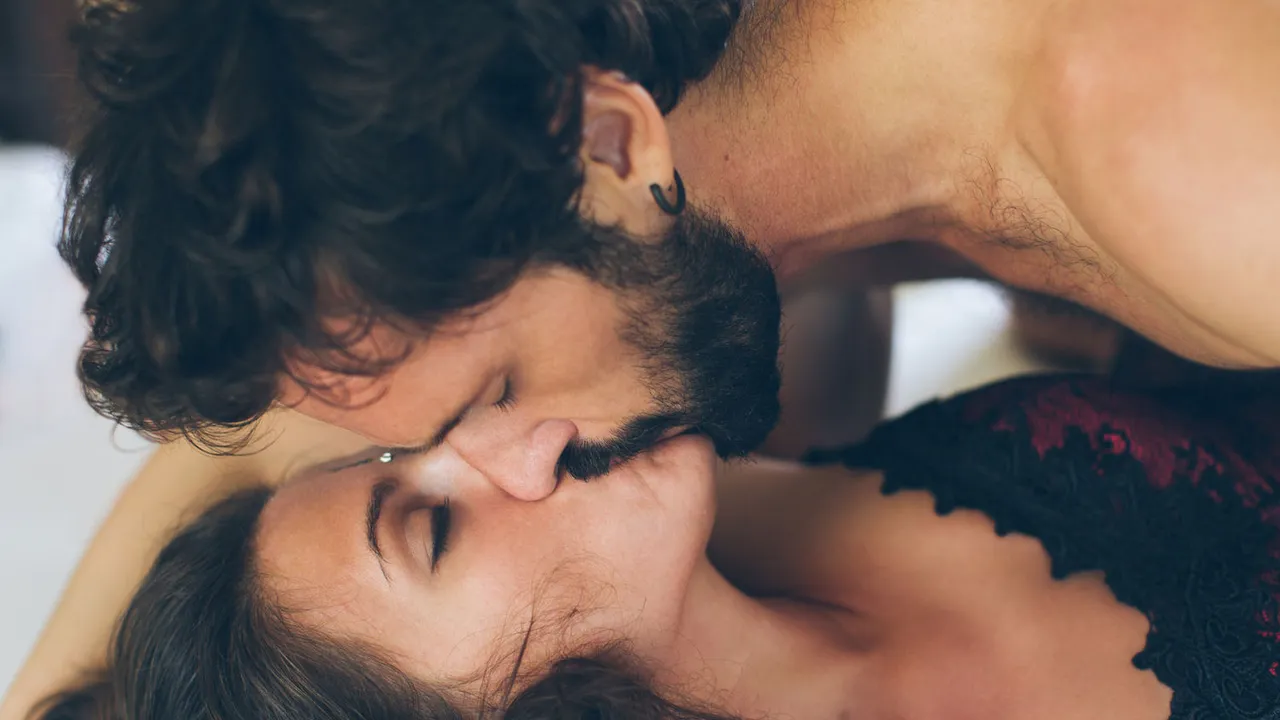 Sexy man and woman kissing