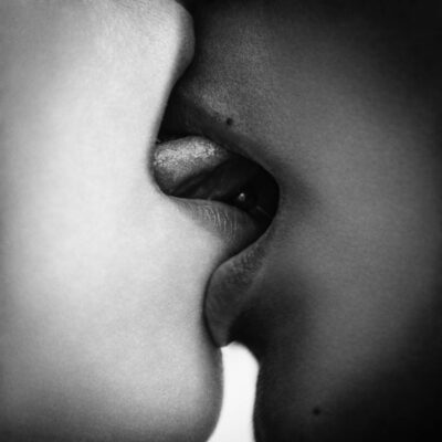 Two women kissing