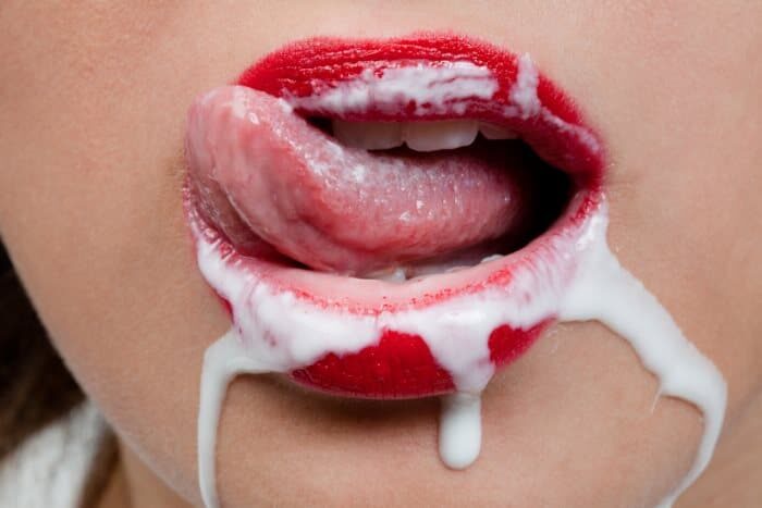 Womans mouth with milk