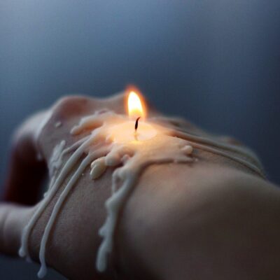 Hand with candle on it