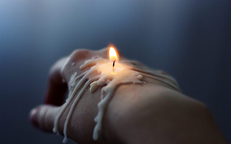 Hand with candle on it