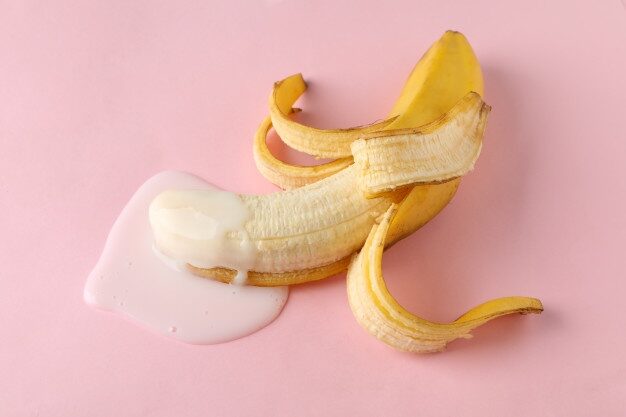 Banana with milk on table