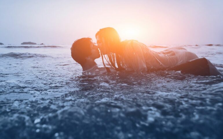 Man and woman in the water/beach