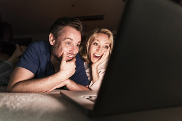 Man and woman watch porn