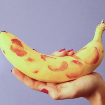 Banana with lipstick kisses all over it