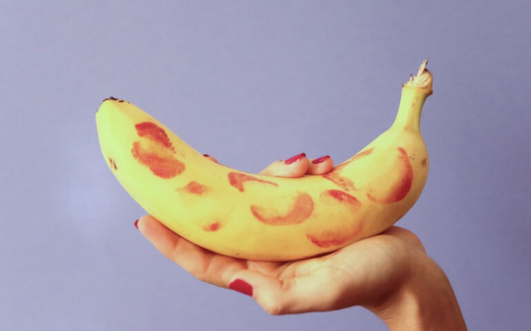 Banana with lipstick kisses all over it