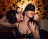 Sexy couple, woman is blindfolded