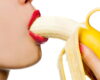 Woman eating a banana